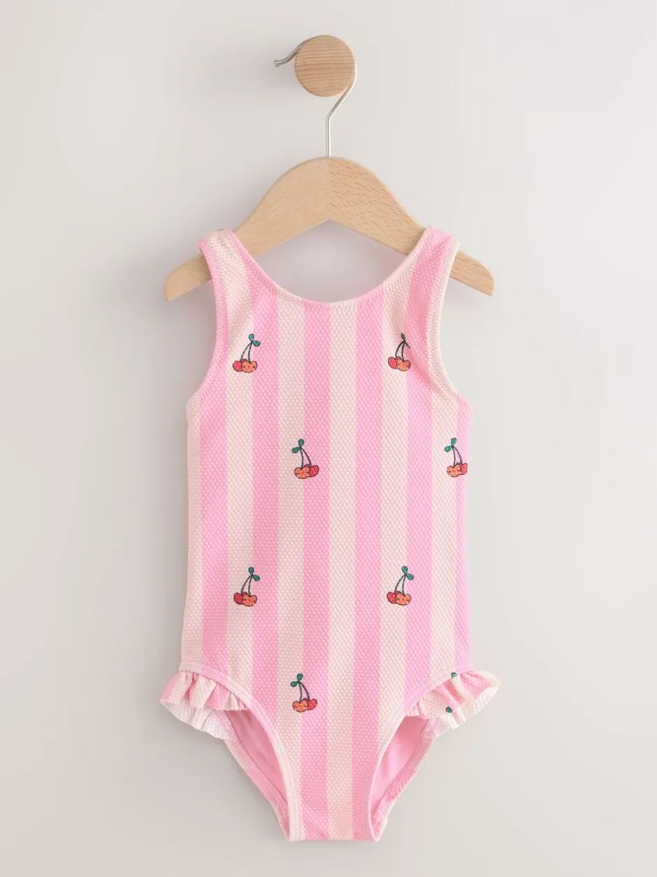Badkleding|Badkleding|Next - Badpak met ruches op de pijpen (3mnd -7jr) Roze met streep- en kersenprint