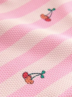 Badkleding|Badkleding|Next - Badpak met ruches op de pijpen (3mnd -7jr) Roze met streep- en kersenprint