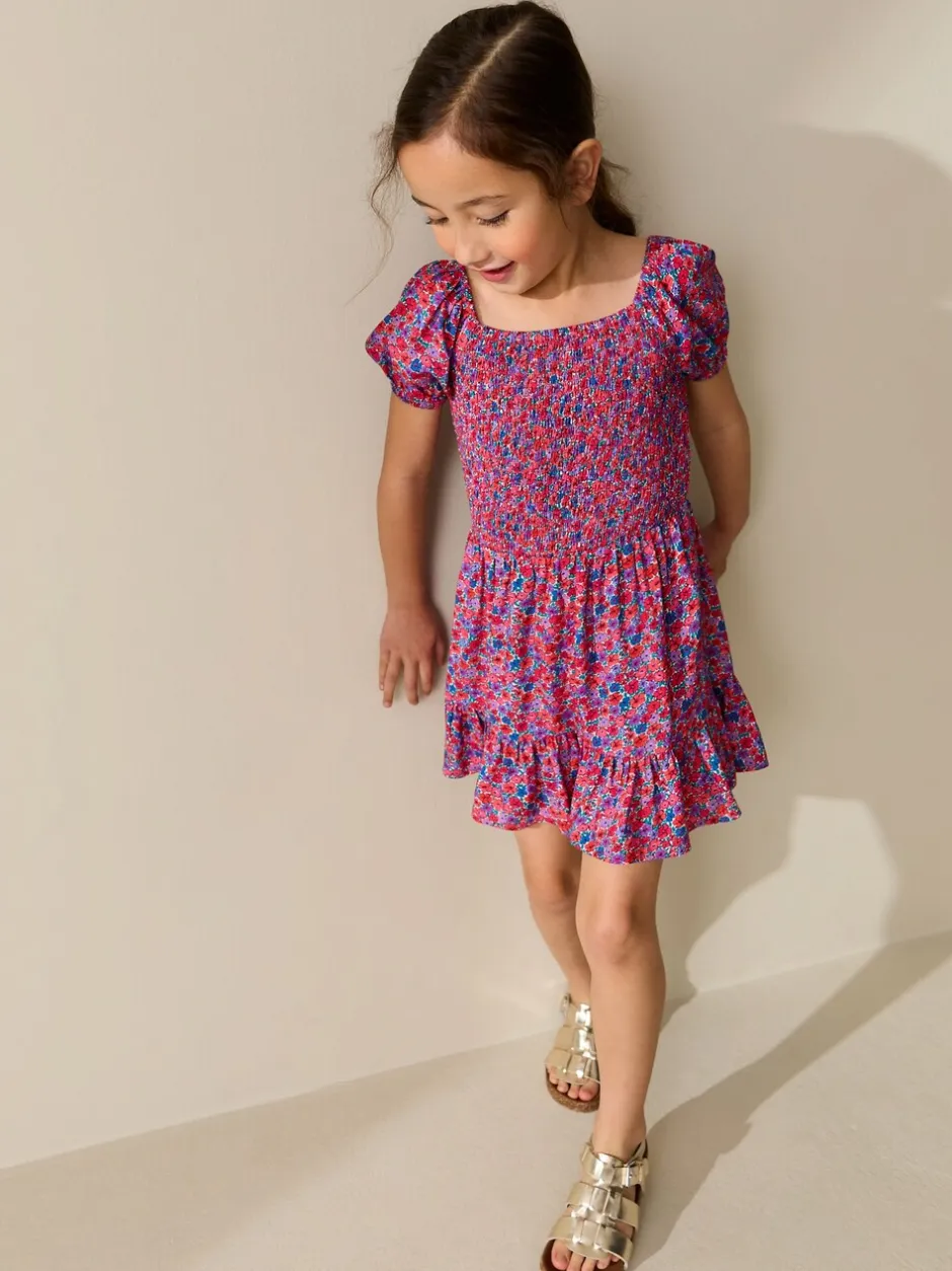 Jumpsuits En Playsuits*Next Roze met vrolijke print - Romper met smokwerk (3-16jr)