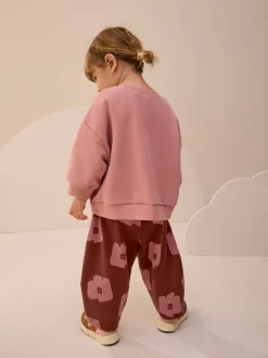 Sets En Combisets|Truien En Breisels*Next Roze/bruine tomaat - Set van sweatshirt en joggingbroek met rechte wijde pijpen (3mnd -7jr)
