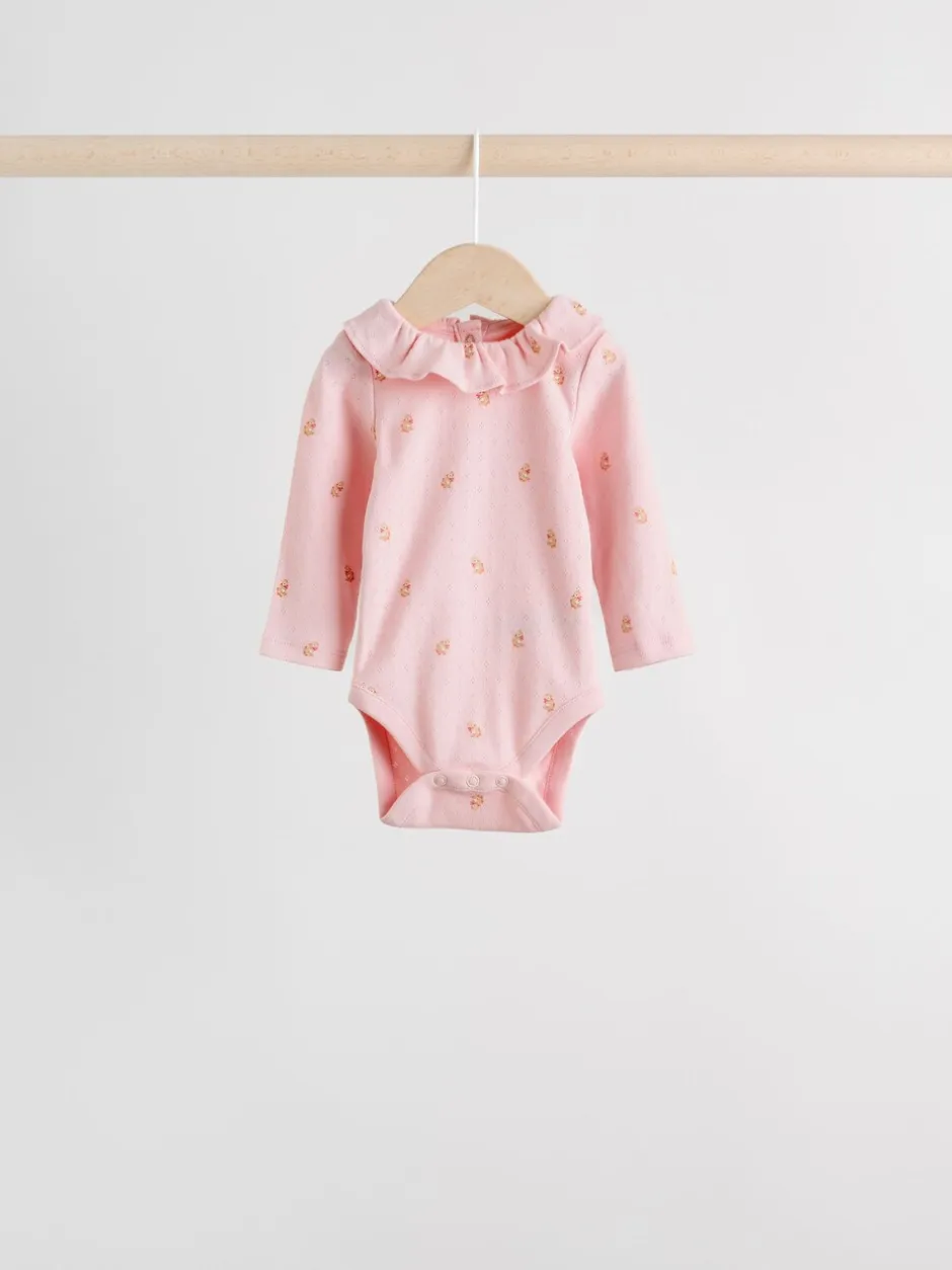 Rompertjes En Hemdjes*Next - Verpakking van 4 babyrompers met lange mouwen en ruches (0mnd-2jr) Roze/crème/bruin met fijne bloemetjesprint