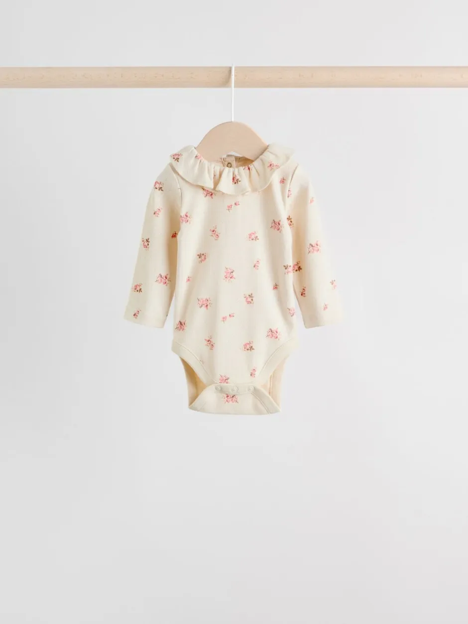 Rompertjes En Hemdjes*Next - Verpakking van 4 babyrompers met lange mouwen en ruches (0mnd-2jr) Roze/crème/bruin met fijne bloemetjesprint
