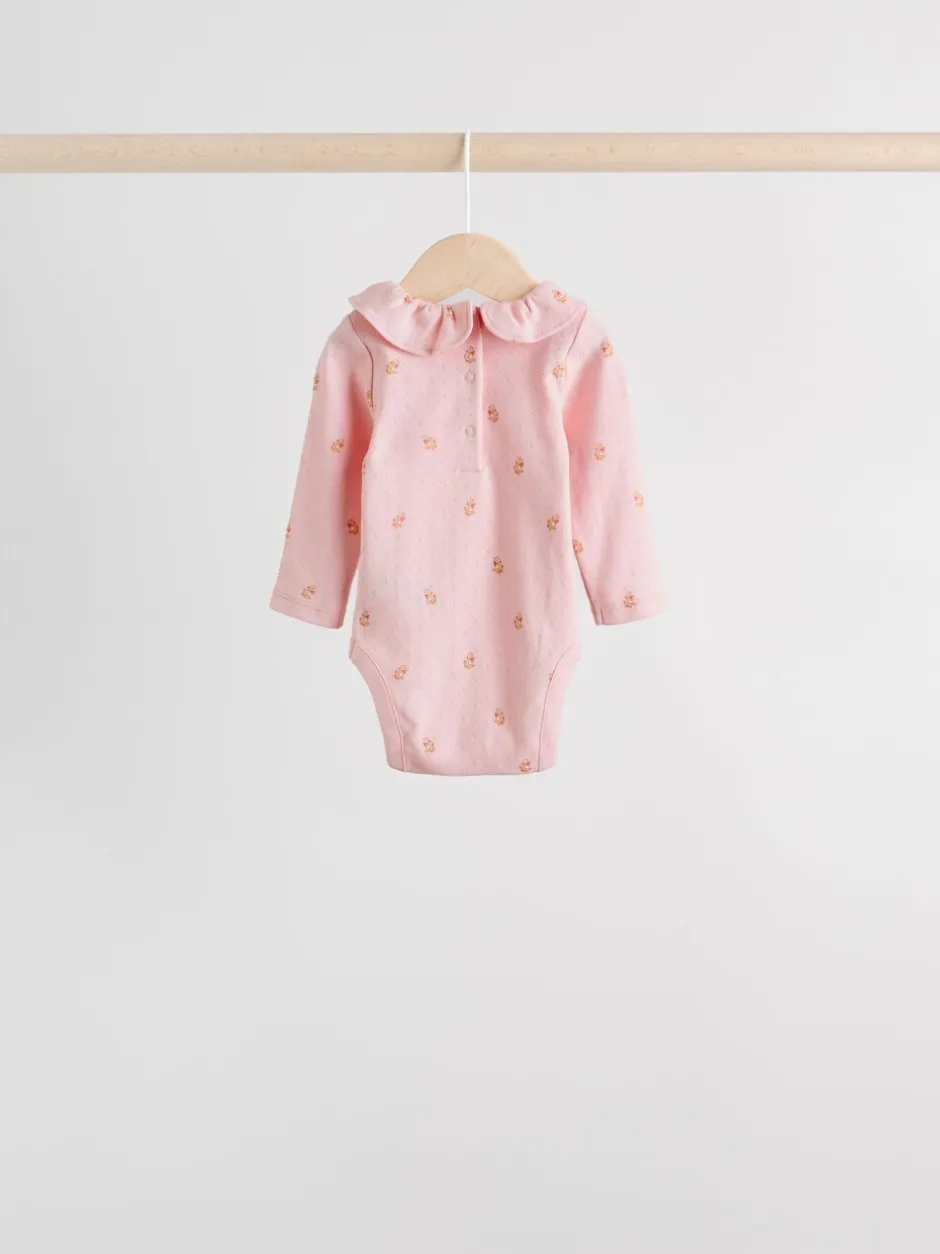 Rompertjes En Hemdjes*Next - Verpakking van 4 babyrompers met lange mouwen en ruches (0mnd-2jr) Roze/crème/bruin met fijne bloemetjesprint