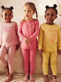 Multipacks|Nachtkleding En Pyjama's|Next - Verpakking van 3 knusse pyjama's met print (9 mnd - 12 jr) Roze/geel met slogan