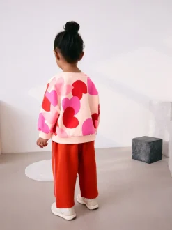 Sets En Combisets|Truien En Breisels*Next Roze/rood met hart - Set van sweatshirt en joggingbroek met rechte wijde pijpen (3mnd -7jr)
