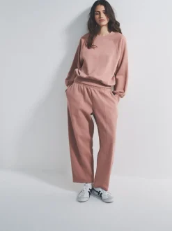 Hoody's En Sweatshirts|The Set - Combi-Set van oversized Sweatshirt met raglanmouwen en Barrel jeans Joggingbroeken