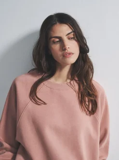 Hoody's En Sweatshirts|The Set - Combi-Set van oversized Sweatshirt met raglanmouwen en Barrel jeans Joggingbroeken