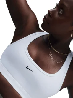 Beha's|Sportkleding|Nike - Swoosh sportbeha met lichte ondersteuning Wit