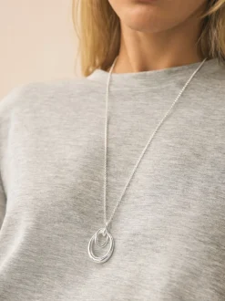 Sieraden*Next - Ketting met hangertje van vereende ringen Zilverkleurig