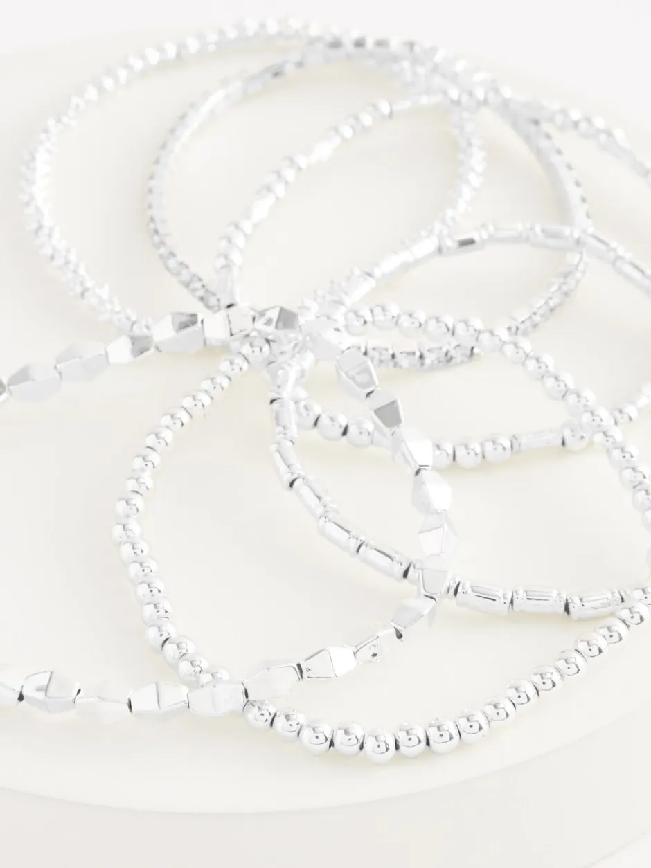 Sieraden|Next - Set van glinsterende rekbare armbanden Zilverkleurig