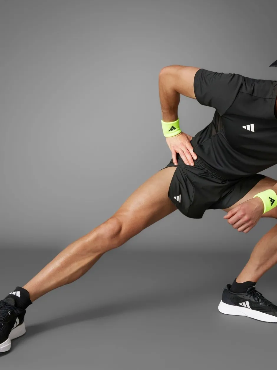 Shorts|adidas - Adizero Essentials hardloopshorts met split Zwart