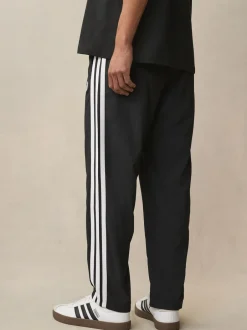 Sportkleding|Joggingbroeken*adidas - Essentials 3-Strepen Stanford joggingbroek met open zoom Zwart