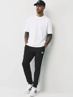 Joggingbroeken*adidas - Essentials fleece joggingbroek met 3 strepen Zwart