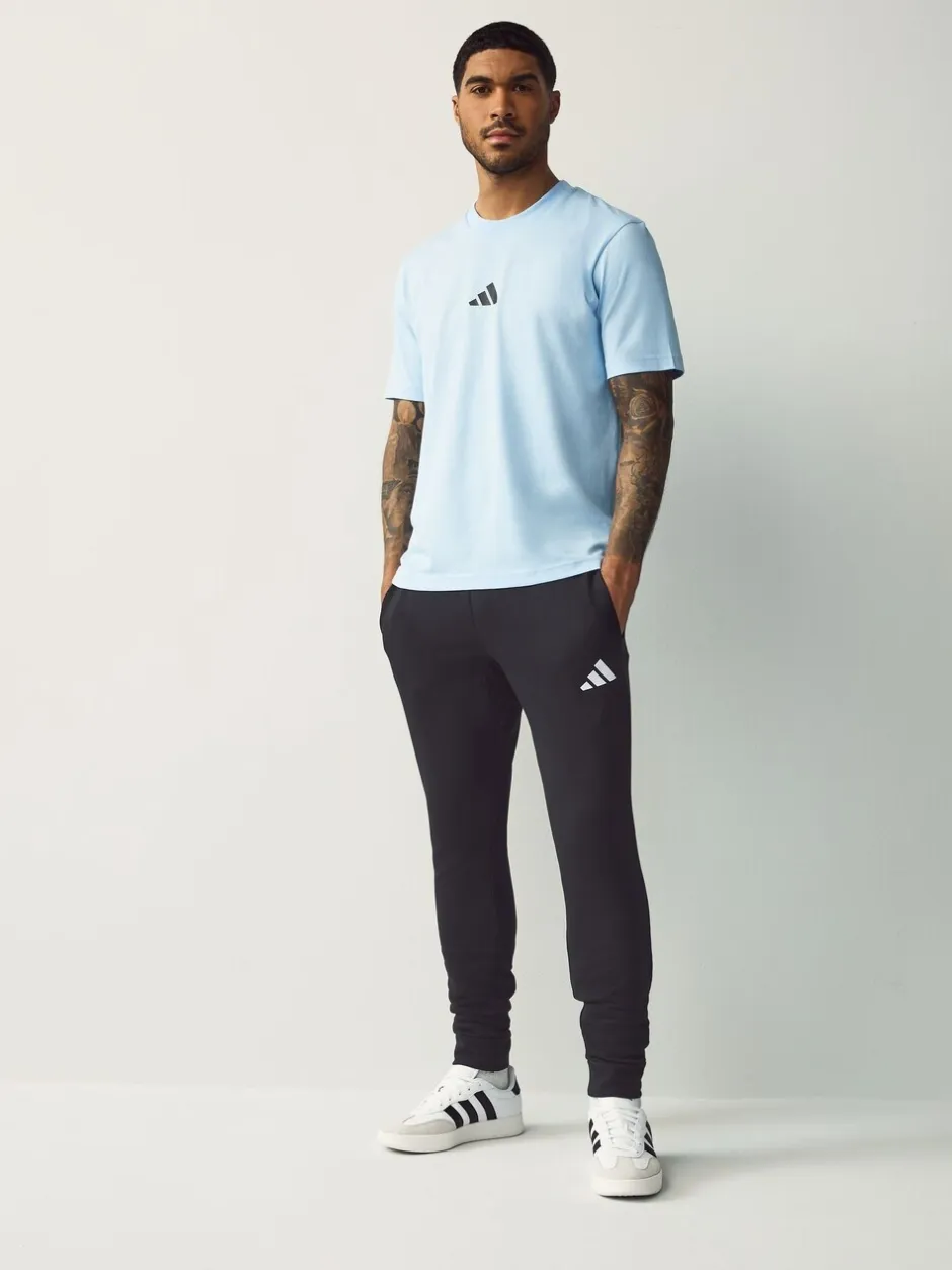 Joggingbroeken|adidas - Essentials Feelcozy fleece joggingbroek Zwart