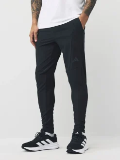 Sportkleding|Joggingbroeken*adidas - hybride joggingbroek ontworpen voor training Zwart