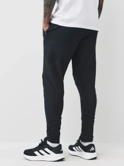 Sportkleding|Joggingbroeken*adidas - hybride joggingbroek ontworpen voor training Zwart
