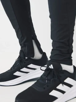 Sportkleding|Joggingbroeken*adidas - hybride joggingbroek ontworpen voor training Zwart