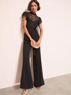 Jumpsuits En Playsuits*Friends Like These - jumpsuit van kant en scubamix met ruches aan de mouwen Zwart