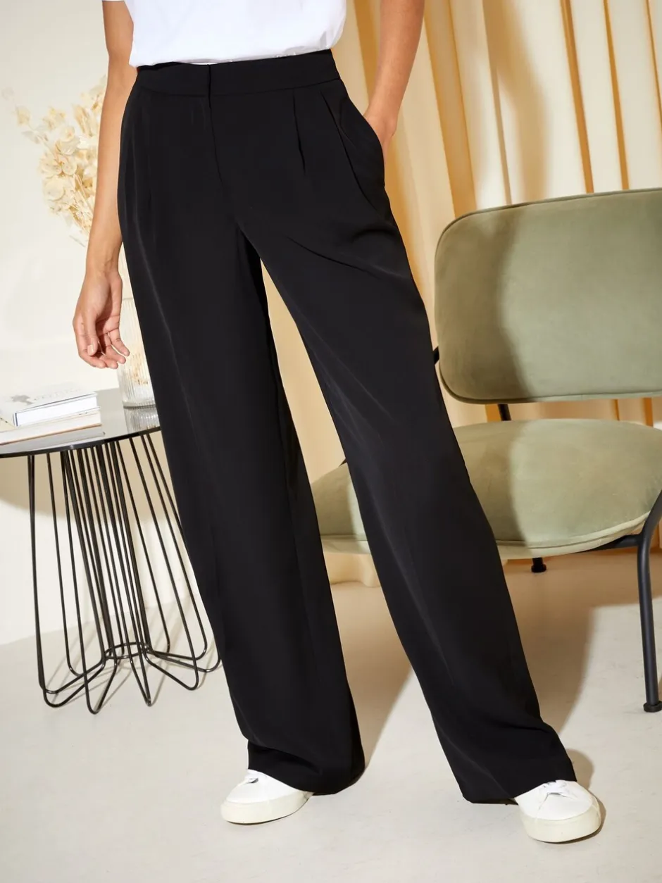 Kostuums En Werkkleding|Broeken|Friends Like These Zwart - Premium broek met wijde pijpen en elastiek aan de achterkant