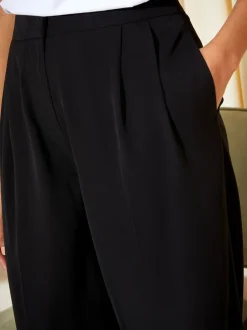 Kostuums En Werkkleding|Broeken|Friends Like These Zwart - Premium broek met wijde pijpen en elastiek aan de achterkant
