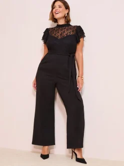 Jumpsuits En Playsuits|Friends Like These Zwart - jumpsuit van kant en scubamix met ruches aan de mouwen