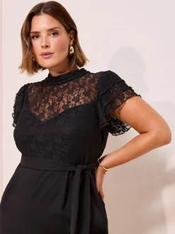 Jumpsuits En Playsuits|Friends Like These Zwart - jumpsuit van kant en scubamix met ruches aan de mouwen