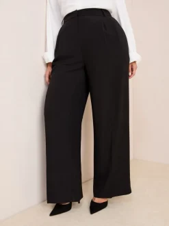 Kostuums En Werkkleding|Broeken*Friends Like These - Premium broek met wijde pijpen en elastiek aan de achterkant Zwart