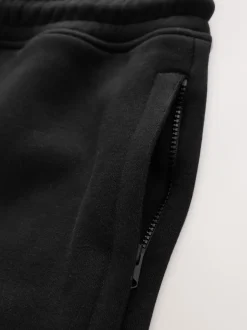 Shorts*Next - Geborstelde jersey shorts met ritszakken Zwart