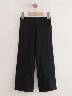 Schoolkleding|Next - Jersey broek met wijde pijpen, stretch en hoog katoengehalte (3-17jr) Zwart