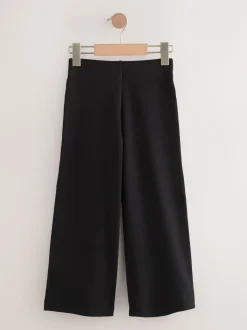 Schoolkleding|Next - Jersey broek met wijde pijpen, stretch en hoog katoengehalte (3-17jr) Zwart