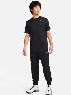 Joggingbroeken*Nike Zwart - Dri-FIT Form trainingsbroek met taps toelopende pijpen