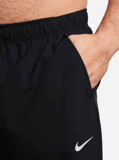 Joggingbroeken*Nike Zwart - Dri-FIT Form trainingsbroek met taps toelopende pijpen