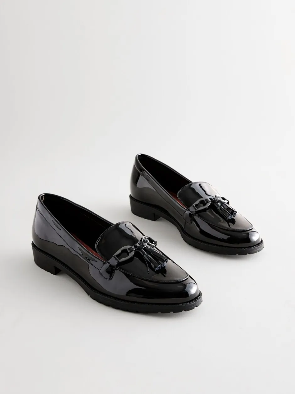 Lage Schoenen|Ruimvallend En Extraruimvallend|Next - Patent kwastje hardware detail Instappers Zwart