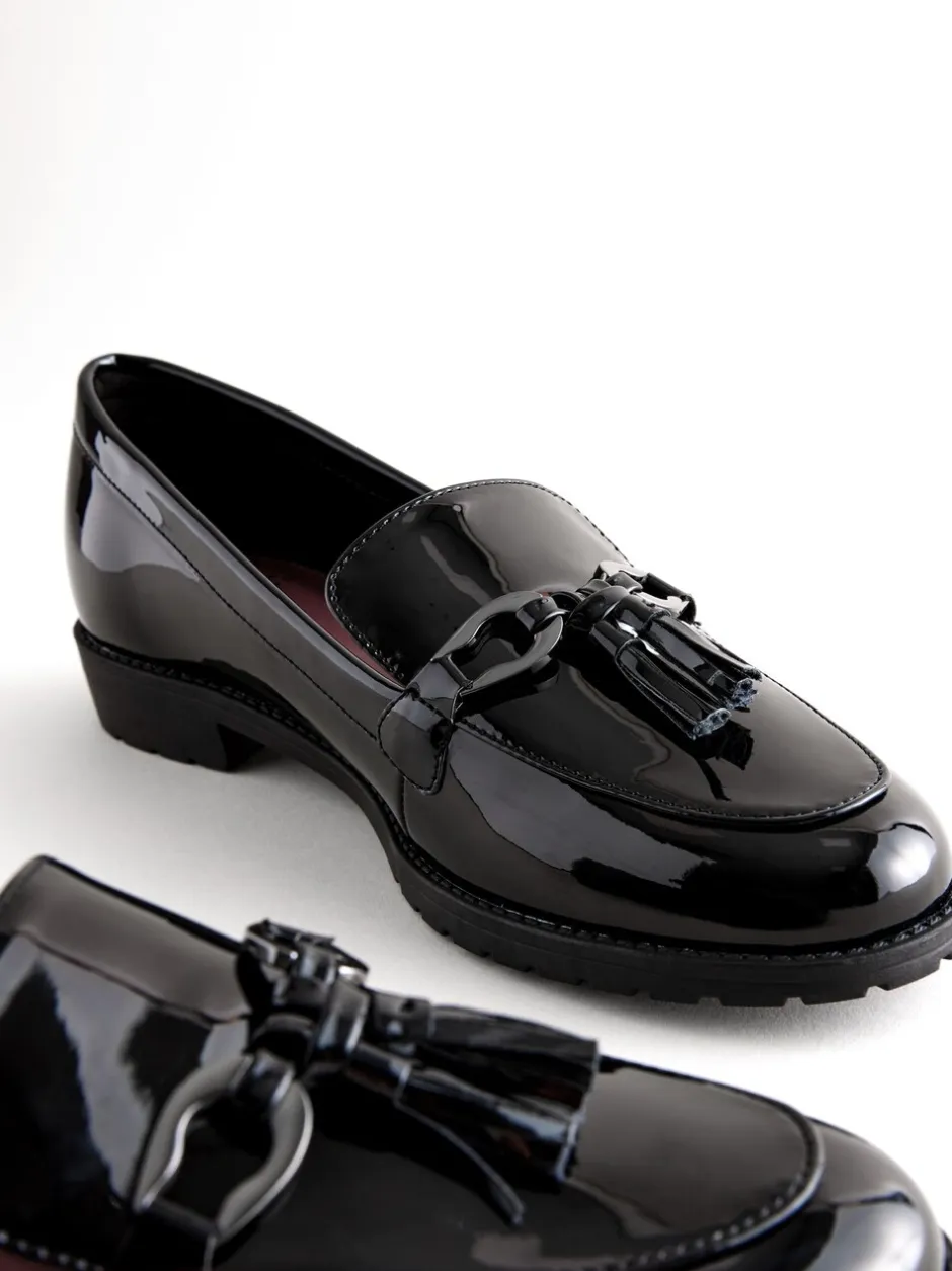 Lage Schoenen|Ruimvallend En Extraruimvallend|Next - Patent kwastje hardware detail Instappers Zwart