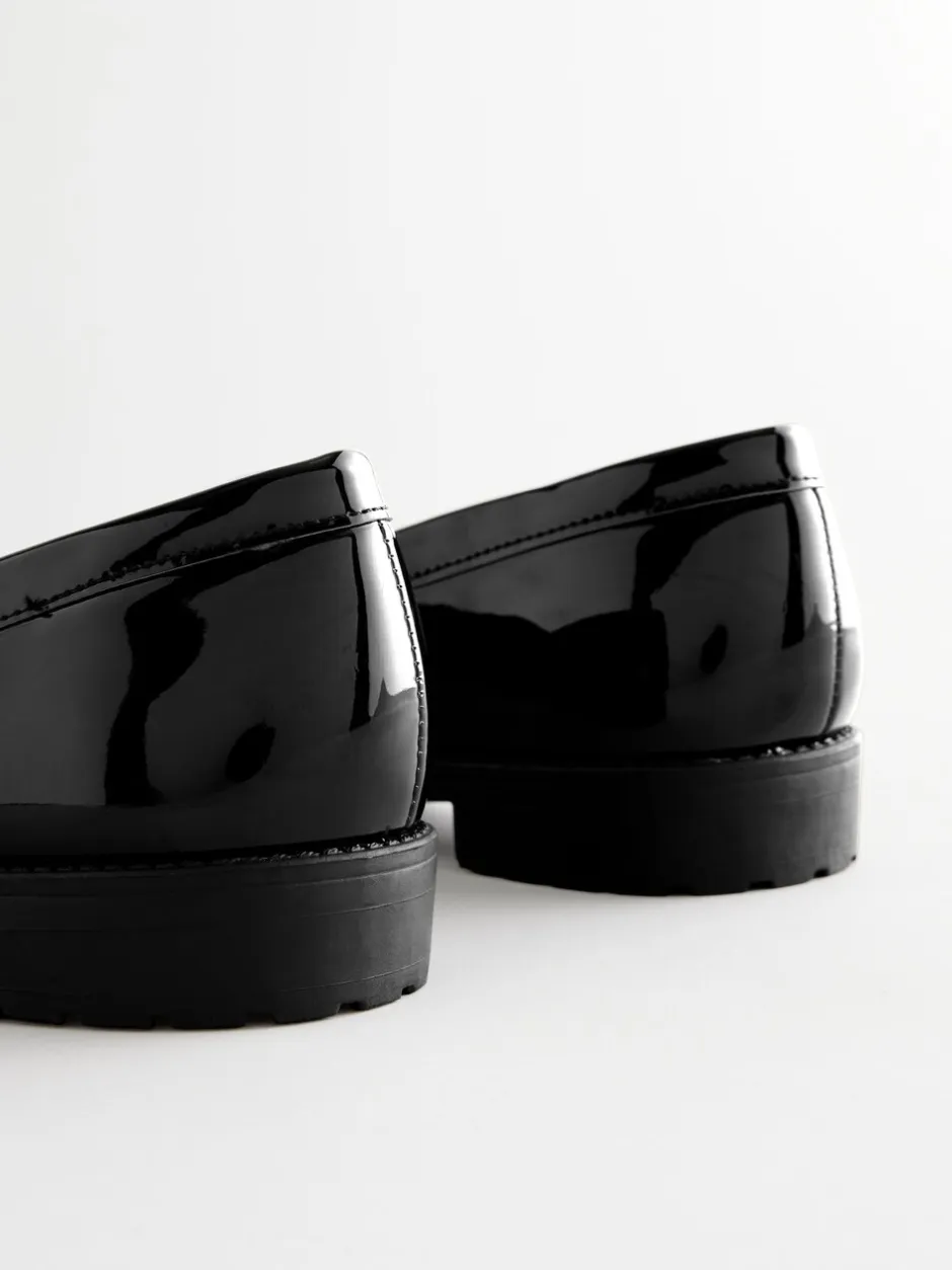 Lage Schoenen|Ruimvallend En Extraruimvallend|Next - Patent kwastje hardware detail Instappers Zwart