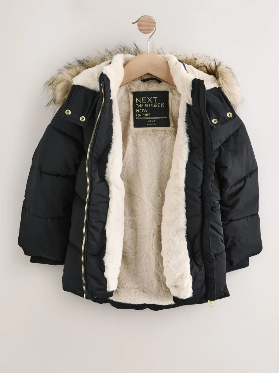 Schoolkleding|Jassen En Jacks|Next Zwart - Regenbestendige gewatteerde jas met imitatiebontrand (3 - 16 jr)