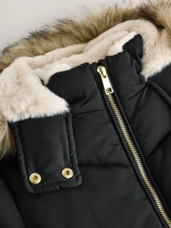 Schoolkleding|Jassen En Jacks|Next Zwart - Regenbestendige gewatteerde jas met imitatiebontrand (3 - 16 jr)
