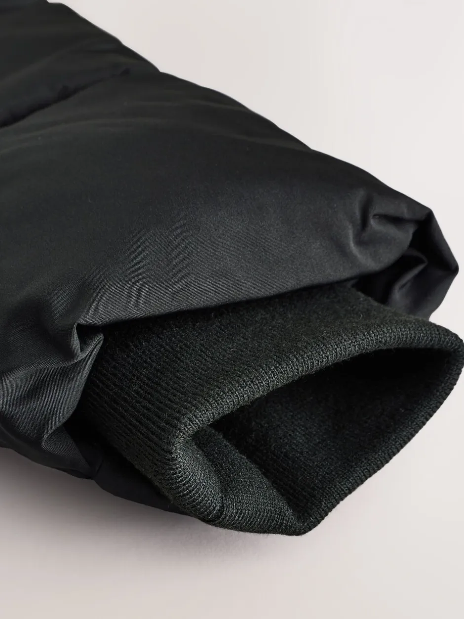 Schoolkleding|Jassen En Jacks|Next Zwart - Regenbestendige gewatteerde jas met imitatiebontrand (3 - 16 jr)
