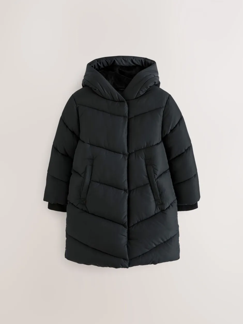 Schoolkleding|Jassen En Jacks|Next - Regenbestendige gewatteerde jas met capuchon en imitatiebontvoering (3 - 16 jr) Zwart