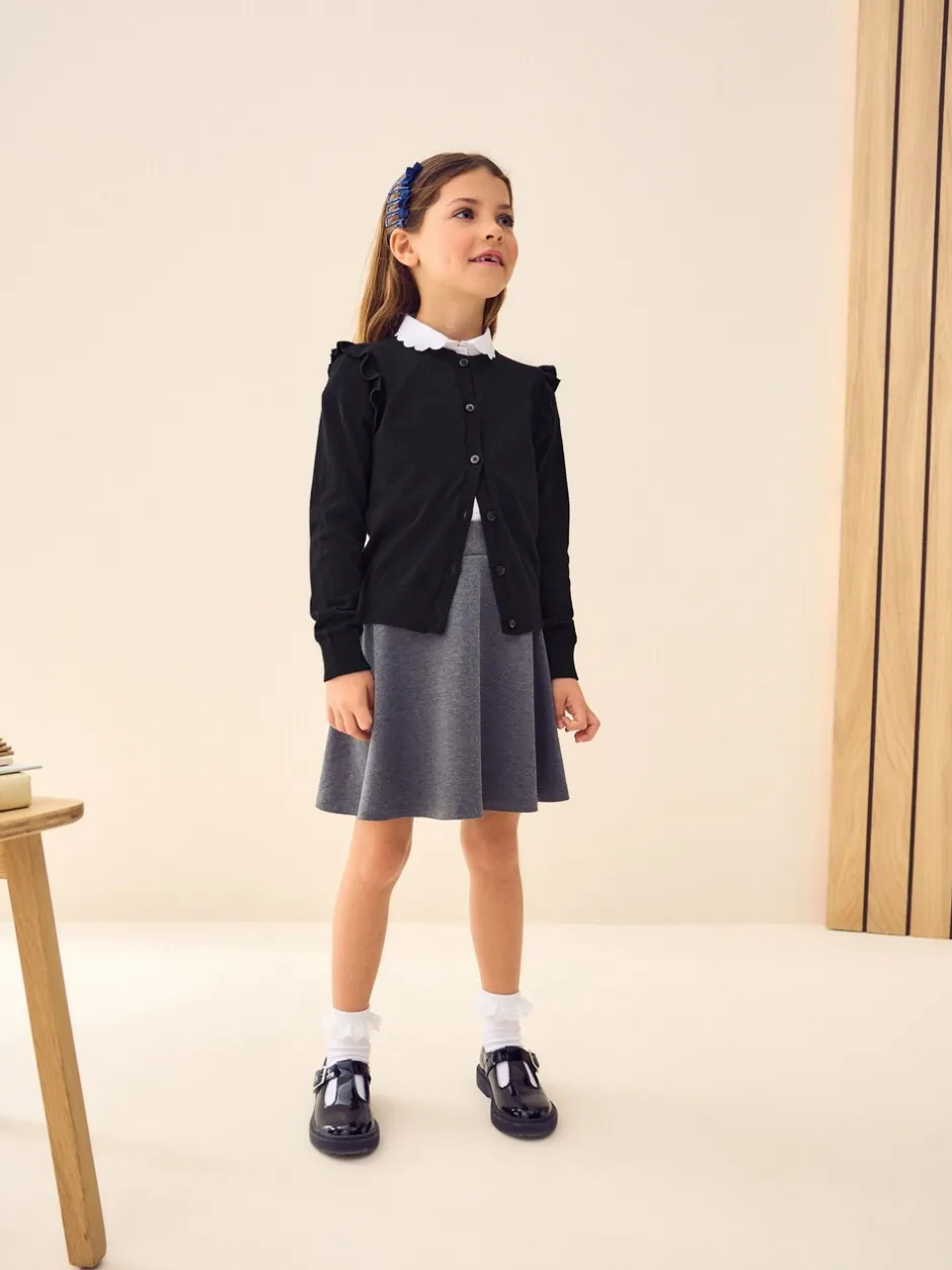 Schoolkleding|Gebreide Kleding*Next Zwart - Schoolvest met hoog katoengehalte en ruches op de schouders (3-16 jr)