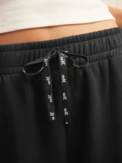 Loungewear|Leggings En Joggingbroeken*self. Zwart - joggingbroek met wijde pijpen