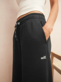 Loungewear|Leggings En Joggingbroeken*self. Zwart - joggingbroek met wijde pijpen