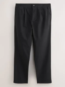 Broeken En Chino's*Next - Standaard toelopende pasvorm - Pleated Stretch Chinos Trousers With Elasticated Waist Zwart