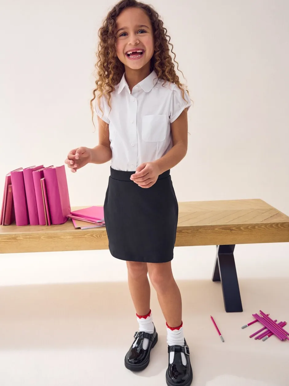 Shorts En Rokken*Next Zwart - Stretchy katoenen jersey schoolschort (3 - 16 jr)