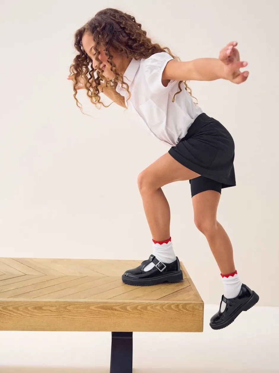 Shorts En Rokken*Next Zwart - Stretchy katoenen jersey schoolschort (3 - 16 jr)