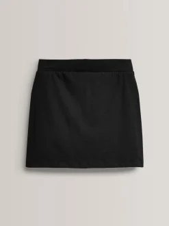 Shorts En Rokken*Next Zwart - Stretchy katoenen jersey schoolschort (3 - 16 jr)