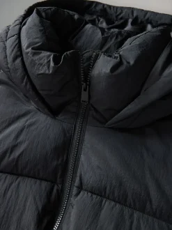 Jassen En Jacks*The Set - Lange gewatteerde midi-jas met capuchon Zwart