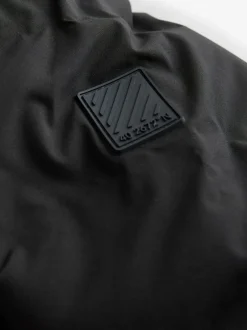 Schoolkleding|Next - Waterdicht halfzwaar jack met capuchon (3-17jr) Zwart
