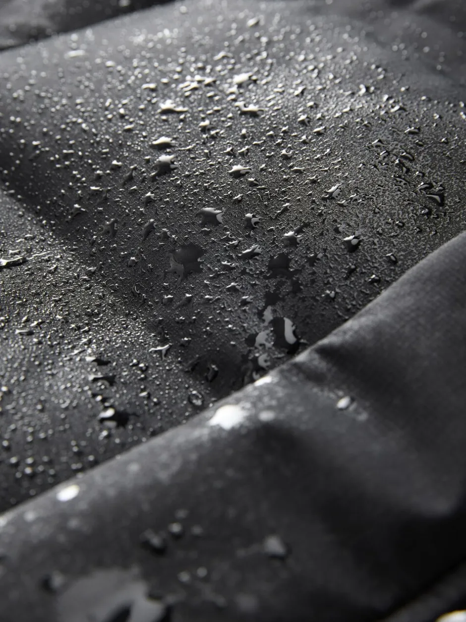 Schoolkleding|Jassen En Jacks|Next - Waterdichte lange pufferjas met fleecevoering (3-17jr) Zwart