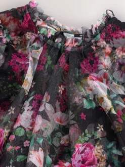 Jurken|Next Zwart bloemenprint - Feestjurk van mesh met lange mouwen (3-16jr)
